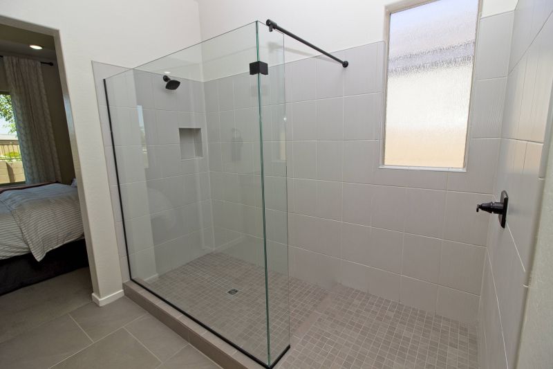 Shower with Frameless Door and Large Tiles